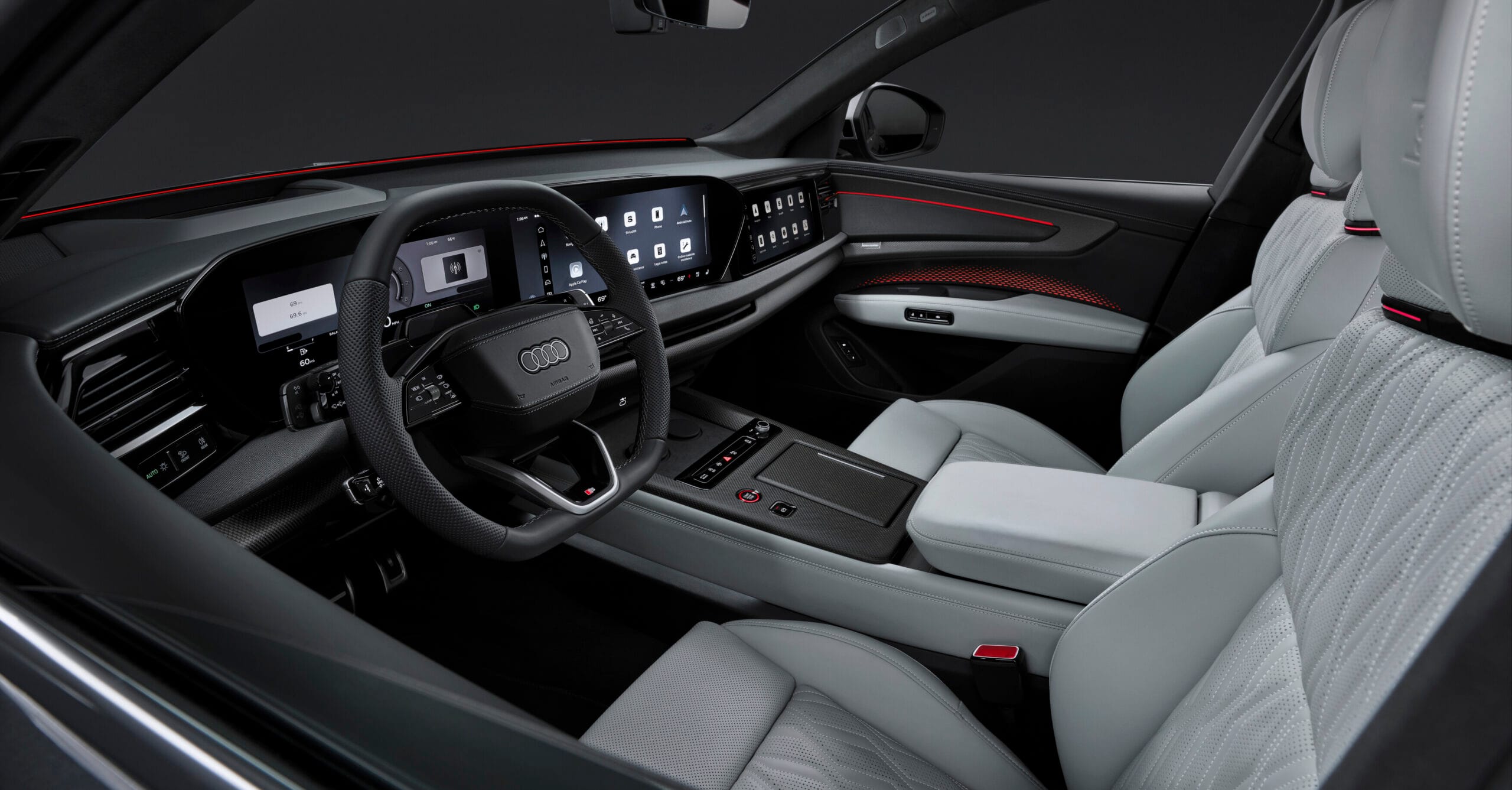 Interior zona delantera del Audi Q9 2026 – Consola central y pantalla MMI